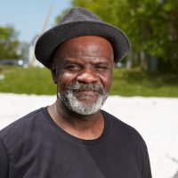 Portrait of man with a hat.